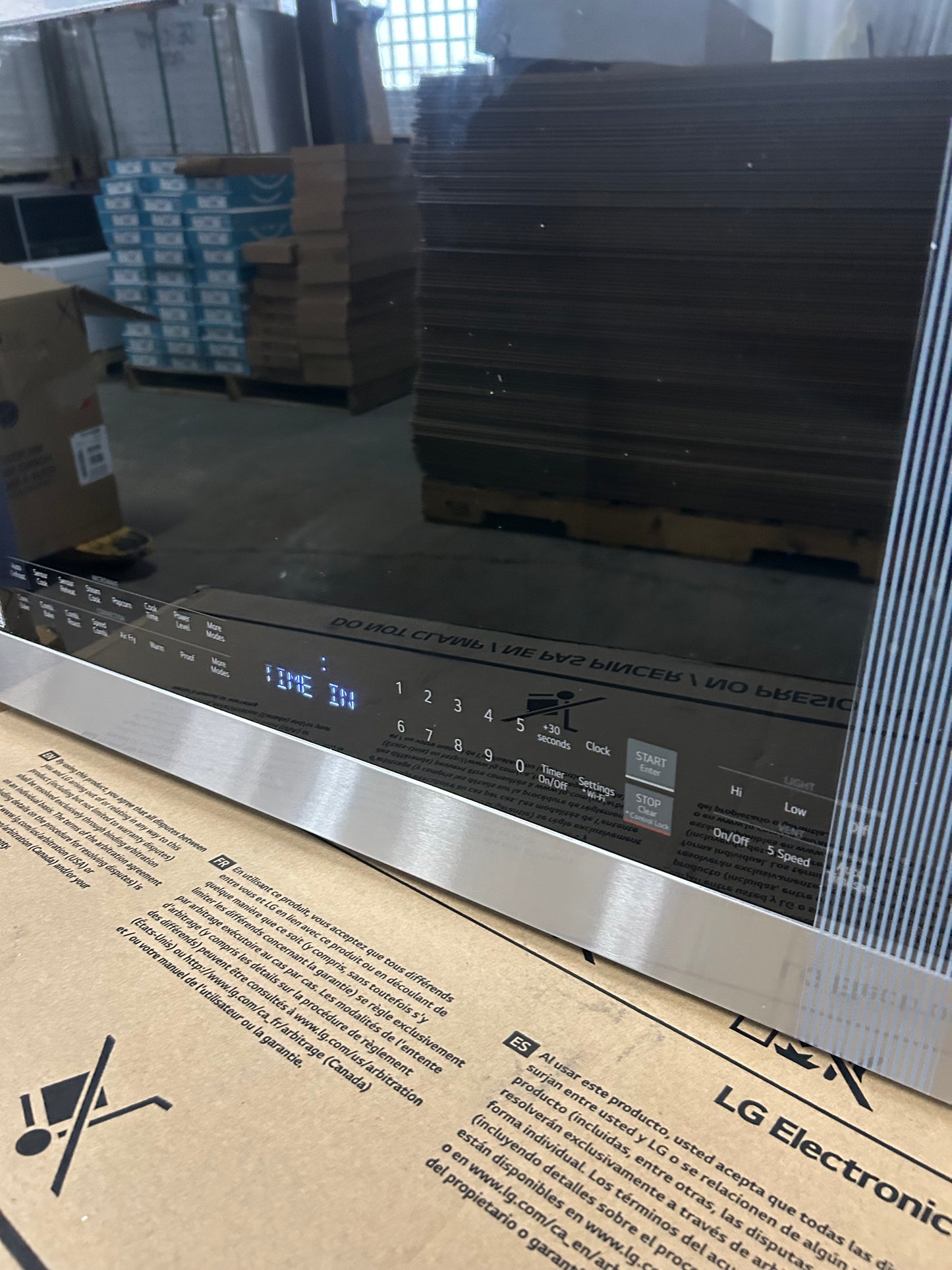 *Slightly Damaged* Smart 1.7 cu. ft. Over the Range Convection Microwave Oven with Air Fry in PrintProof Stainless Steel